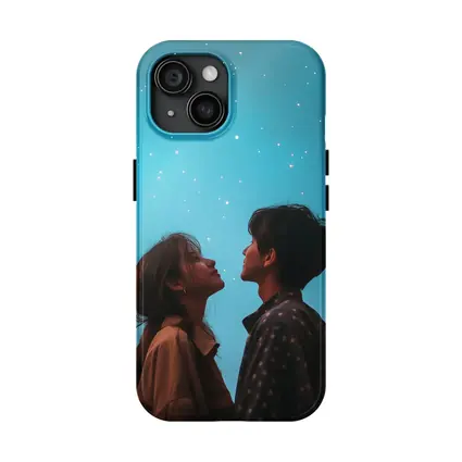 Couple Gazing Up at Starry Blue Sky