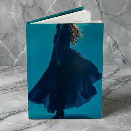 Woman Blue Flowing Dress Teal Background