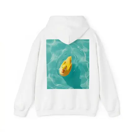 Yellow Rubber Duck Floating Teal Pool