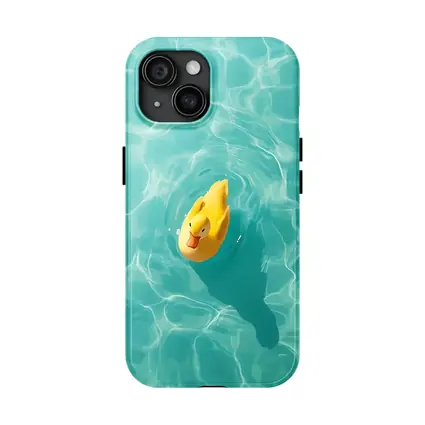 Yellow Rubber Duck Floating Teal Pool