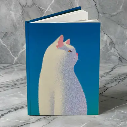 White Cat Sitting Against Blue Sky