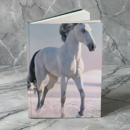 White Horse Running Through Snowy Winter Landscape