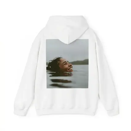 Smiling Woman Swimming In Misty Lake