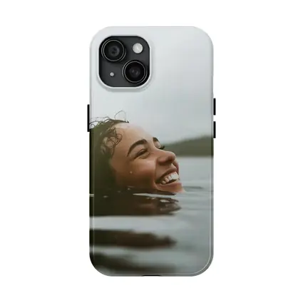 Smiling Woman Swimming In Misty Lake