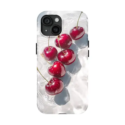Red Cherries Floating On White Water