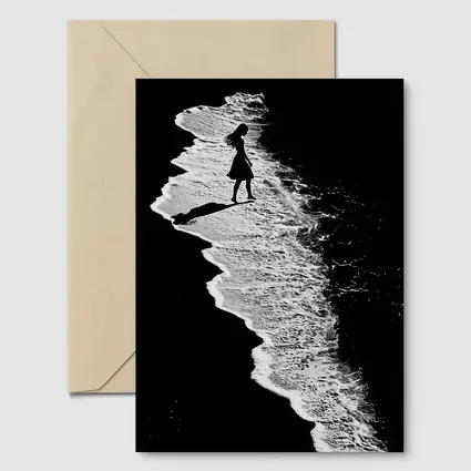Girl Silhouette Walking Along Ocean Shore