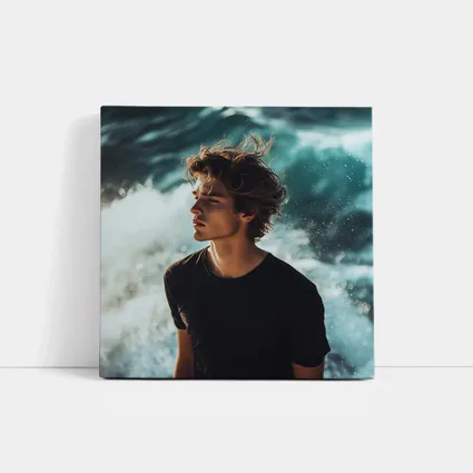 Young Man Standing By Ocean Waves