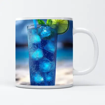 Blue Cocktail With Lime On Beach