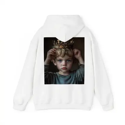 Young Boy Placing Crown Dark Background