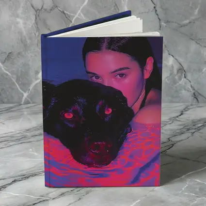 Woman and Black Dog in Neon Pool