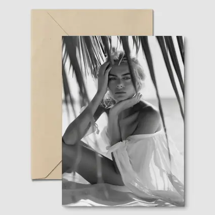 Blonde Woman Sitting Under Palm Tree Beach