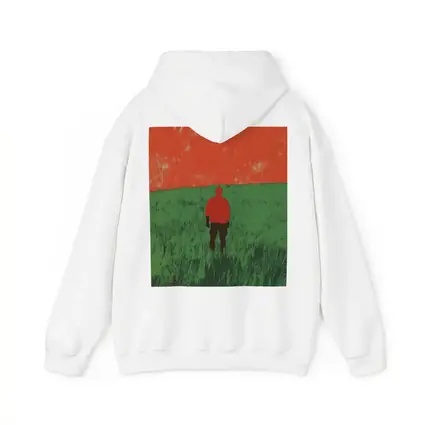 Lone Figure Standing in Green Field