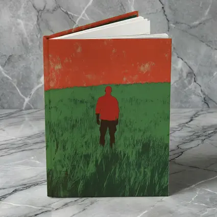 Lone Figure Standing in Green Field