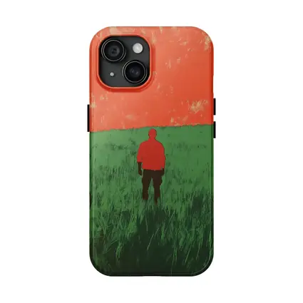 Lone Figure Standing in Green Field