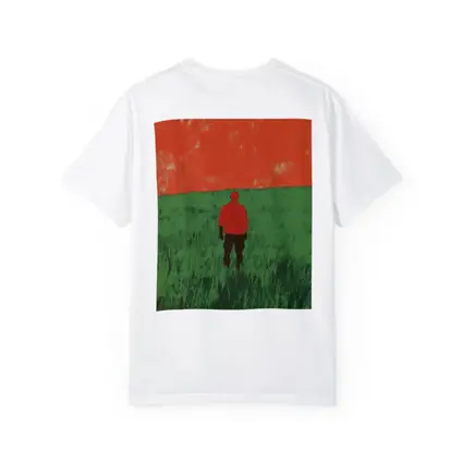 Lone Figure Standing in Green Field