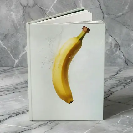 Banana Splashing Through Clear Water Background