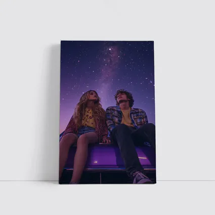 Couple Sitting on Car Under Starry Night
