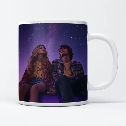 Couple Sitting on Car Under Starry Night