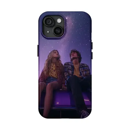 Couple Sitting on Car Under Starry Night