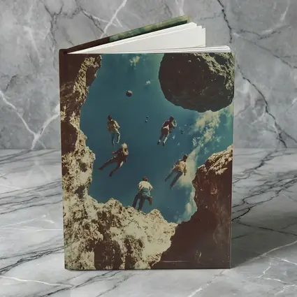 People Floating Above Rocky Cliff Surreal