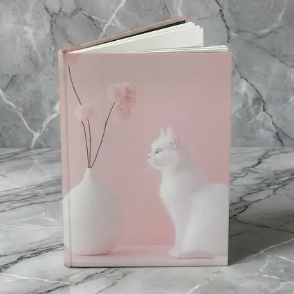 White Cat Beside Vase Pink Background