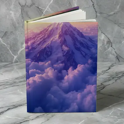 Snow Mountain Peak Rising Above Purple Clouds
