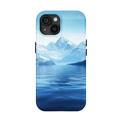 Snow Capped Mountains Over Blue Lake