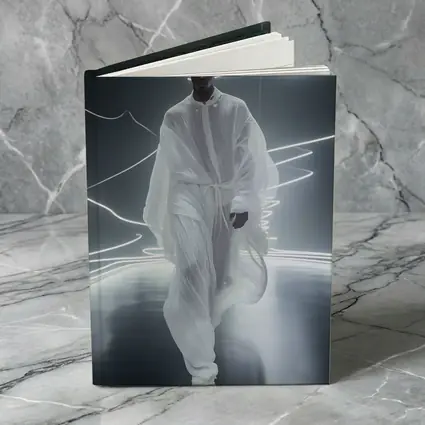 Man White Flowing Robes Neon Light Stage