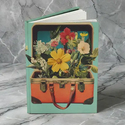 Vintage Suitcase Overflowing With Mixed Flowers