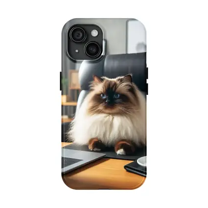 Himalayan Cat Sitting at Office Desk