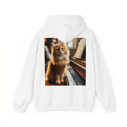 Orange Fluffy Cat Sitting On Piano Keys