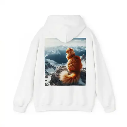 Orange Cat Sitting on Snowy Mountain Peak