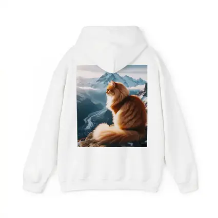 Fluffy Orange Cat Sitting on Mountain Peak