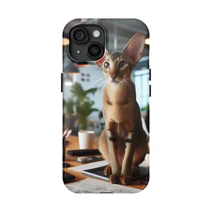 Abyssinian Cat Sitting on Office Desk