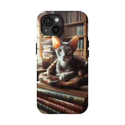 Oriental Shorthair Cat Resting On Books