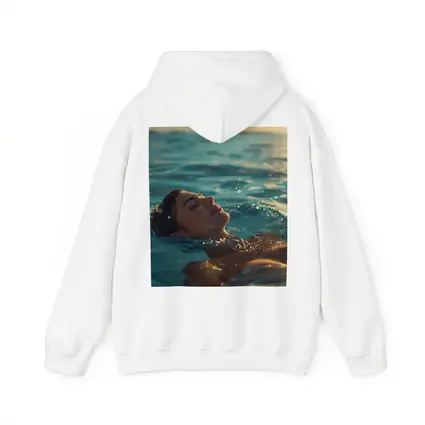Woman Floating In Calm Ocean Water