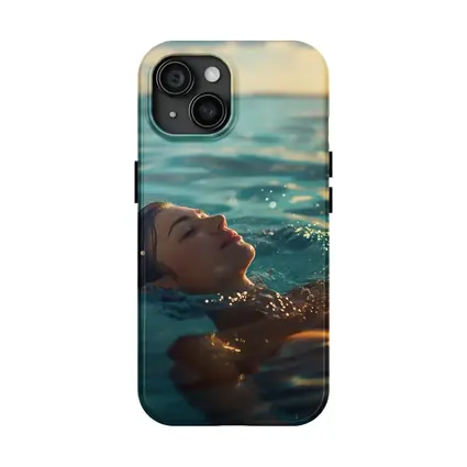 Woman Floating In Calm Ocean Water