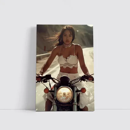 Woman Riding Motorcycle On Open Road