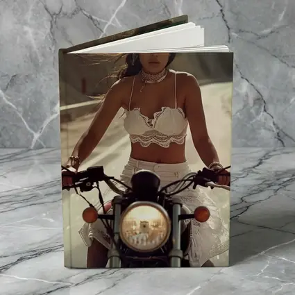 Woman Riding Motorcycle On Open Road