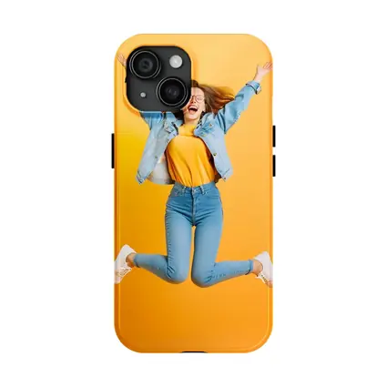 Happy Girl Jumping On Yellow Background