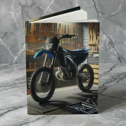 Blue Dirt Bike Parked Inside Mechanic Garage