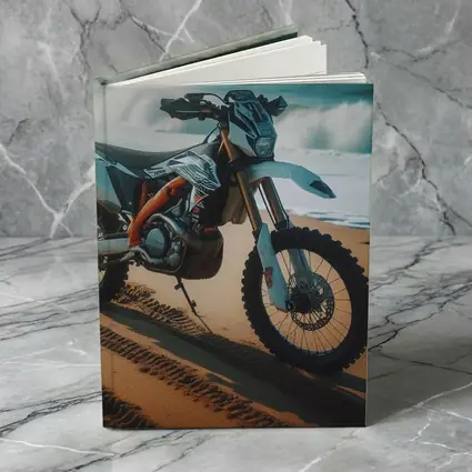 KTM Dirt Bike Parked on Sandy Beach