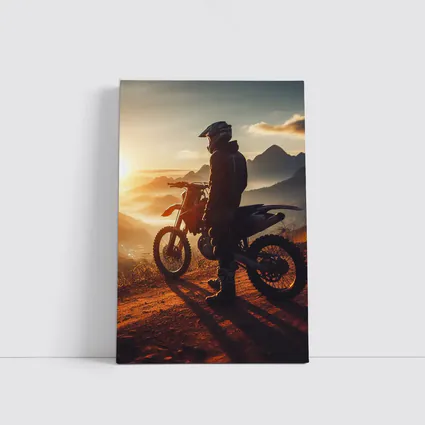 Dirt Bike Rider Watching Sunset Over Mountains