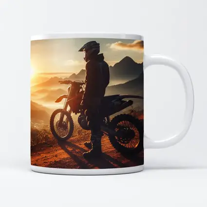 Dirt Bike Rider Watching Sunset Over Mountains