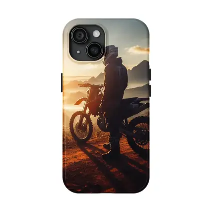 Dirt Bike Rider Watching Sunset Over Mountains