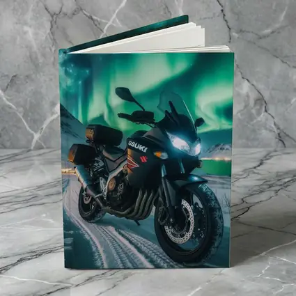 Suzuki Motorcycle Parked Under Northern Lights