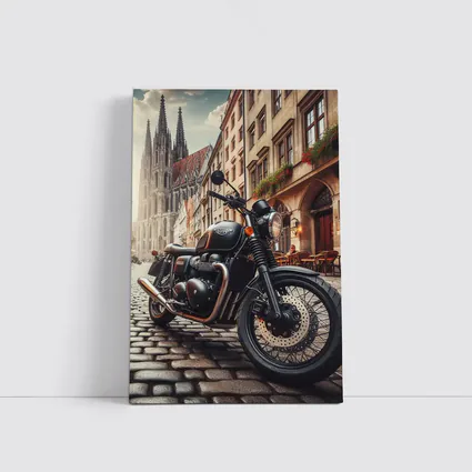 Triumph Motorcycle Parked on European Cobblestone Street