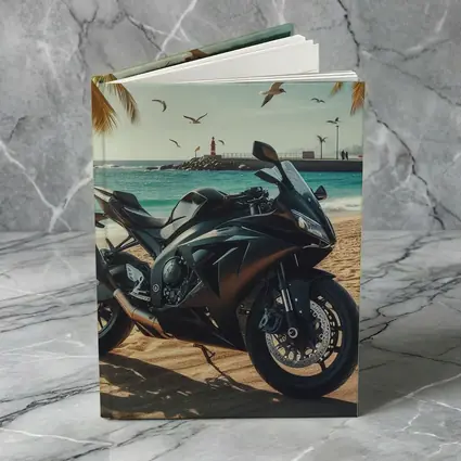 Black Sport Bike Parked on Sunny Beach
