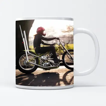 Woman Riding Custom Chopper Motorcycle Street