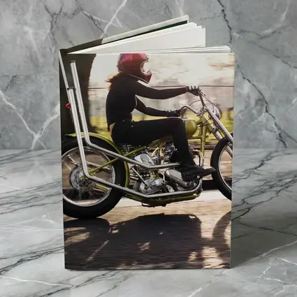 Woman Riding Custom Chopper Motorcycle Street